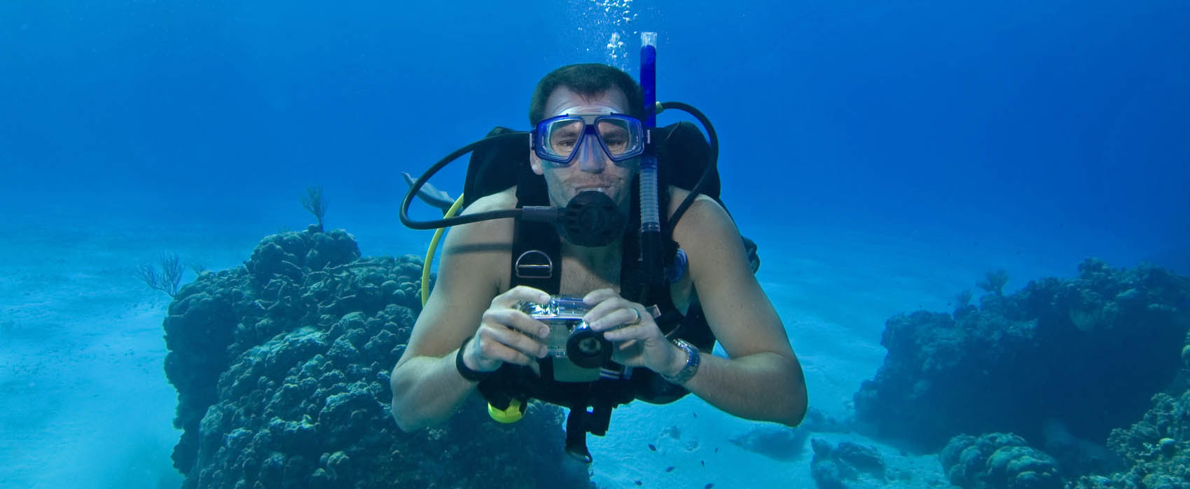Man scuba diving in Cozumel, Mexico